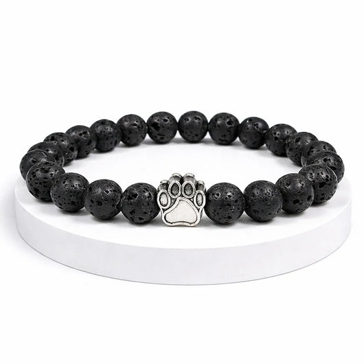 Bracelet Nuit Pattes de Secours — perles pierre de lave noire, breloque patte
