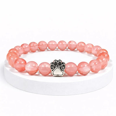 Bracelet Peche Pattes de Secours — perles quartz cerise, breloque patte